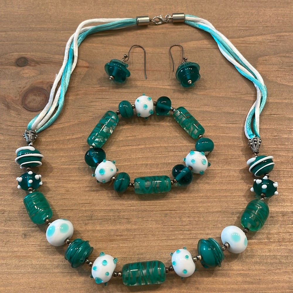 Necklace, bracelet and earrings
